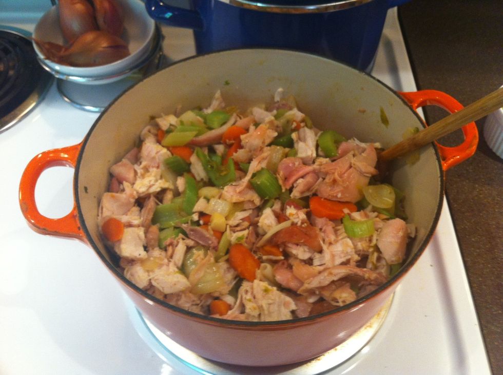 Break down your rotisserie chicken and add it to the veggies (I like to save the carcass to make homemade stock).