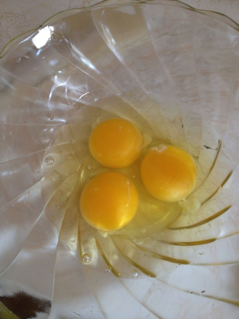 Break into a medium sized bowl.