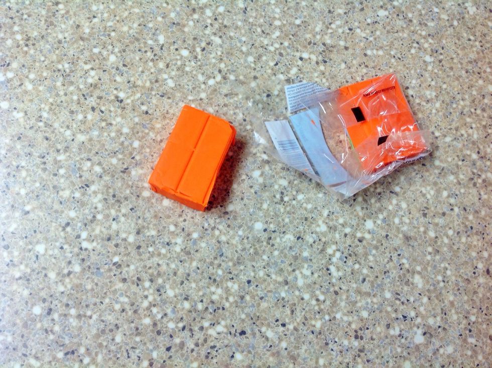 Break off a piece of the orange clay. It can be however large you want.