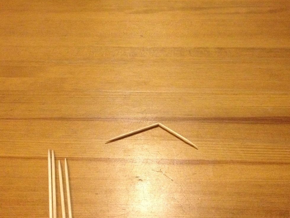 Break one at the middle.  Don't break completely, it needs to stay attached.