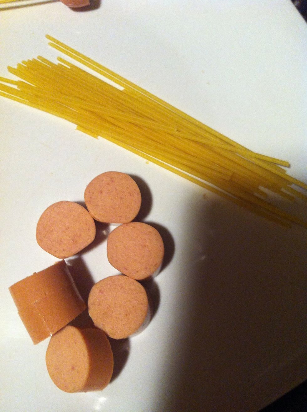 Break spaghetti in half