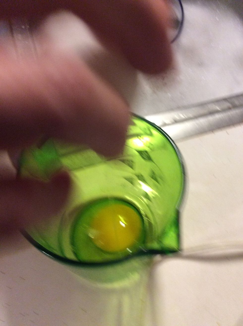 Break the 3 eggs and add them to the the mix one at a time ( make shure there are no egg shells in the container before adding to the mix)