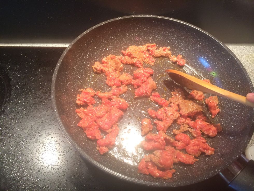 Break the chorizo into small pieces and cook until brown.