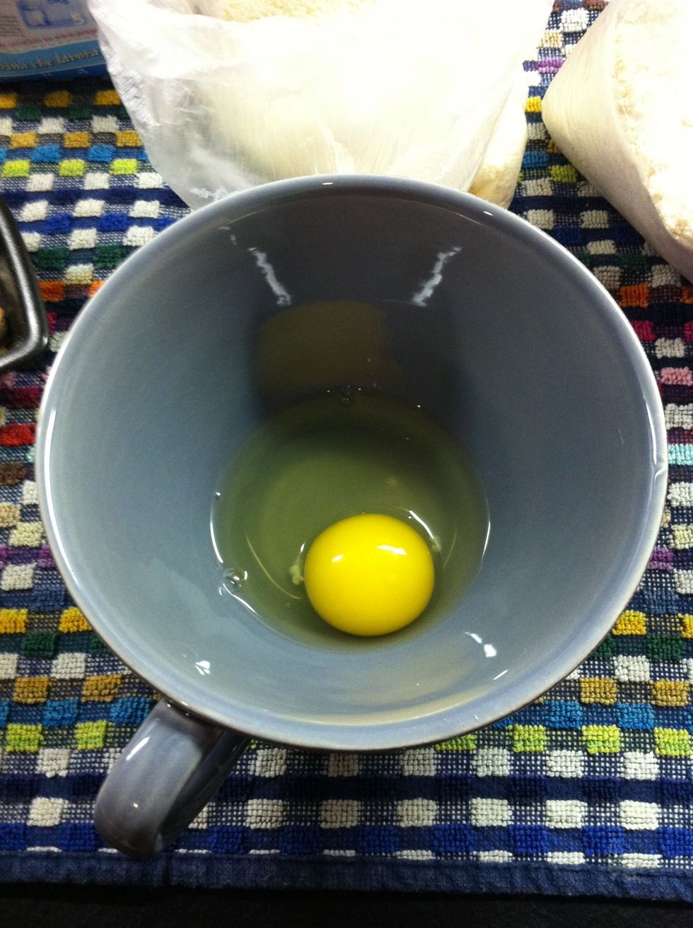 Break the egg in a container