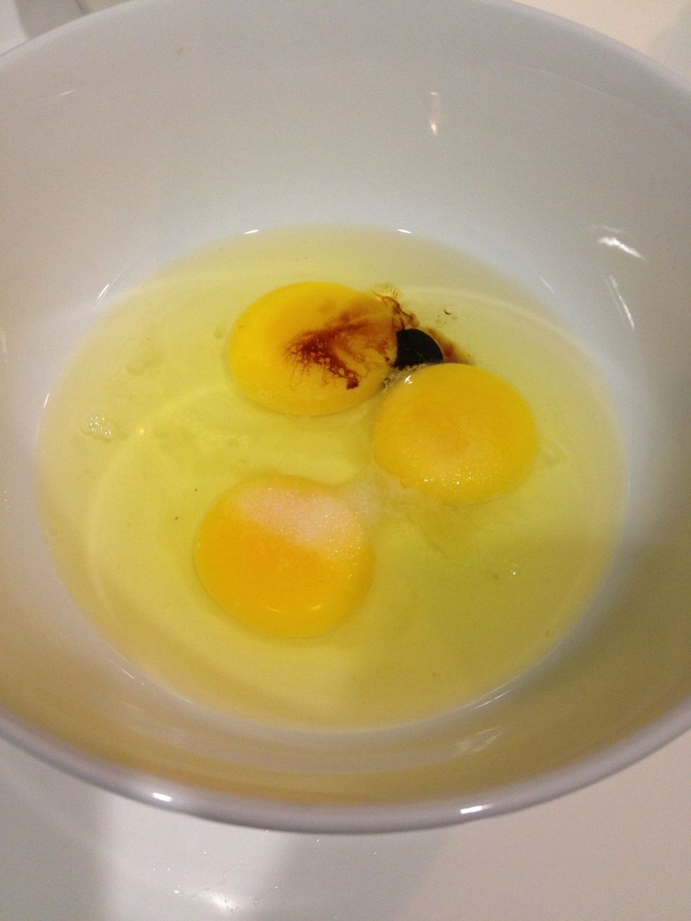 Break the eggs into a big bowl. Add a teaspoon of salt and soy sauce.