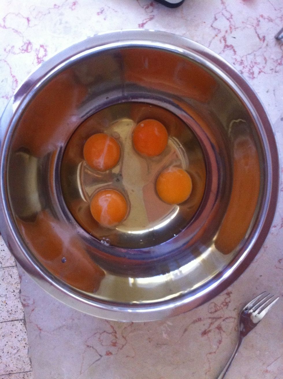 Break the eggs into a bowl