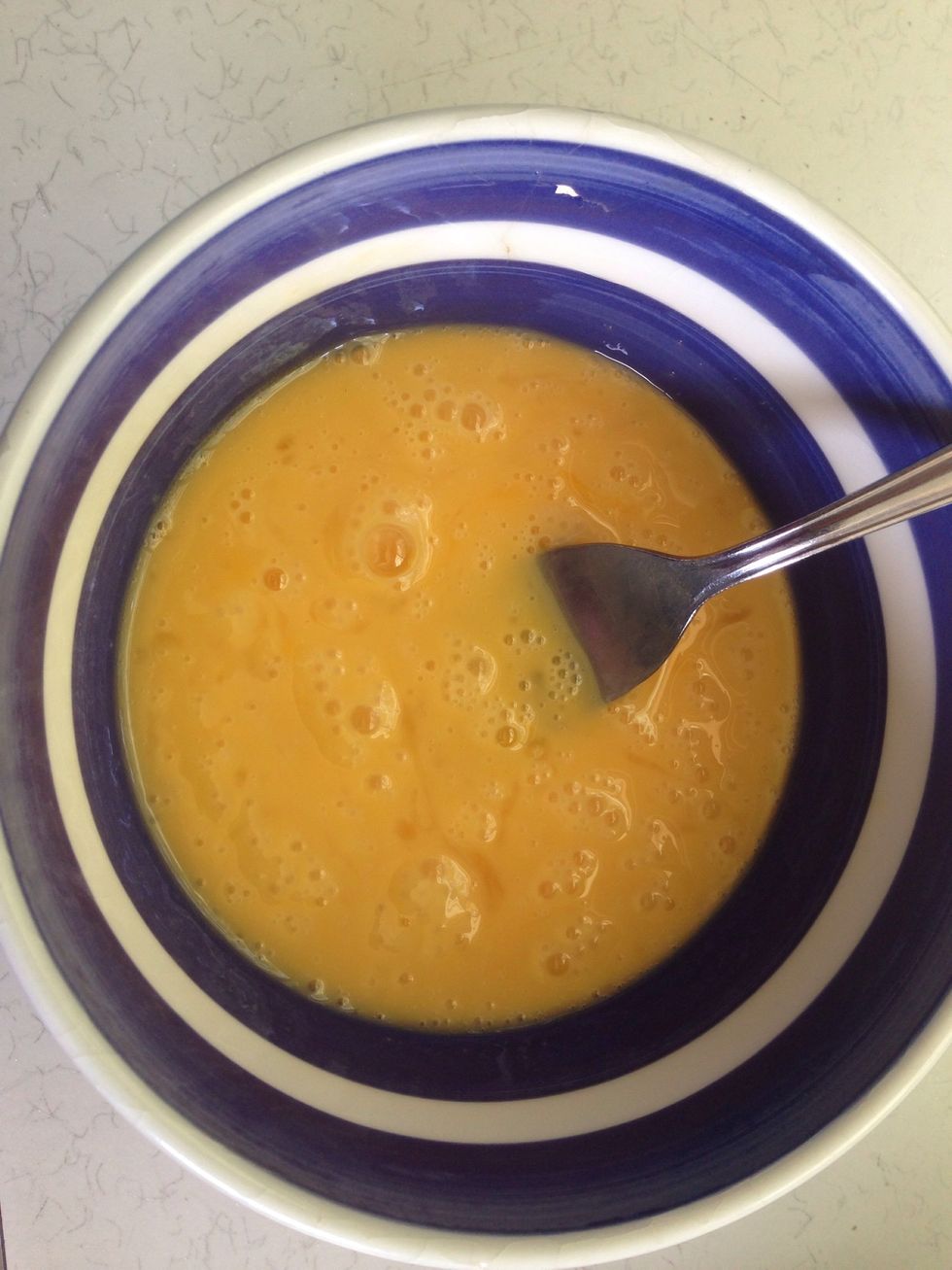 Break the eggs into a small bowl and beat them together. Add the beaten eggs to the butter and sugar mix a little at a time and mix well.