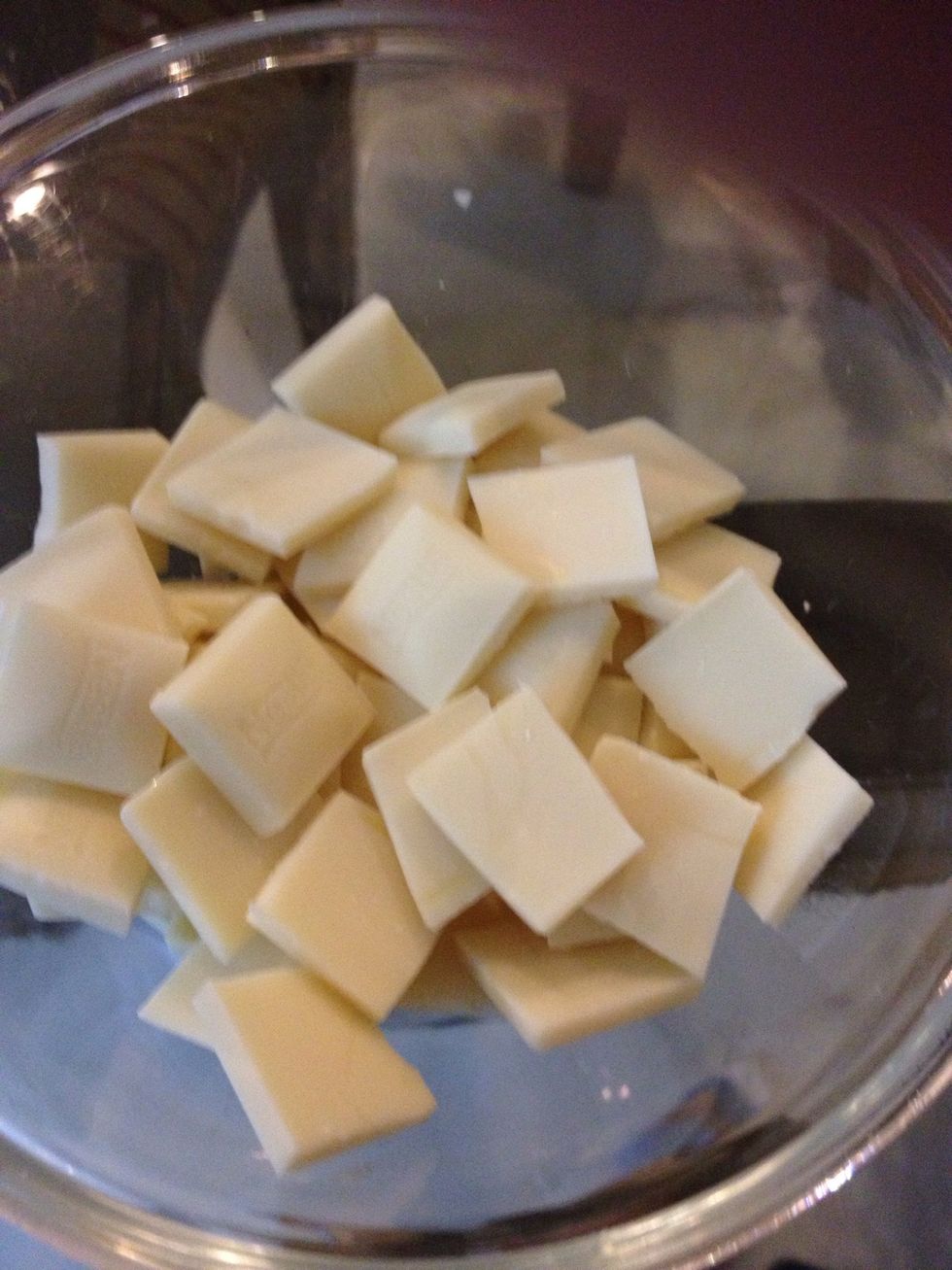 Break the milk and white chocolate into small pieces in separate bowls. Chop them Incase they are big slabs.