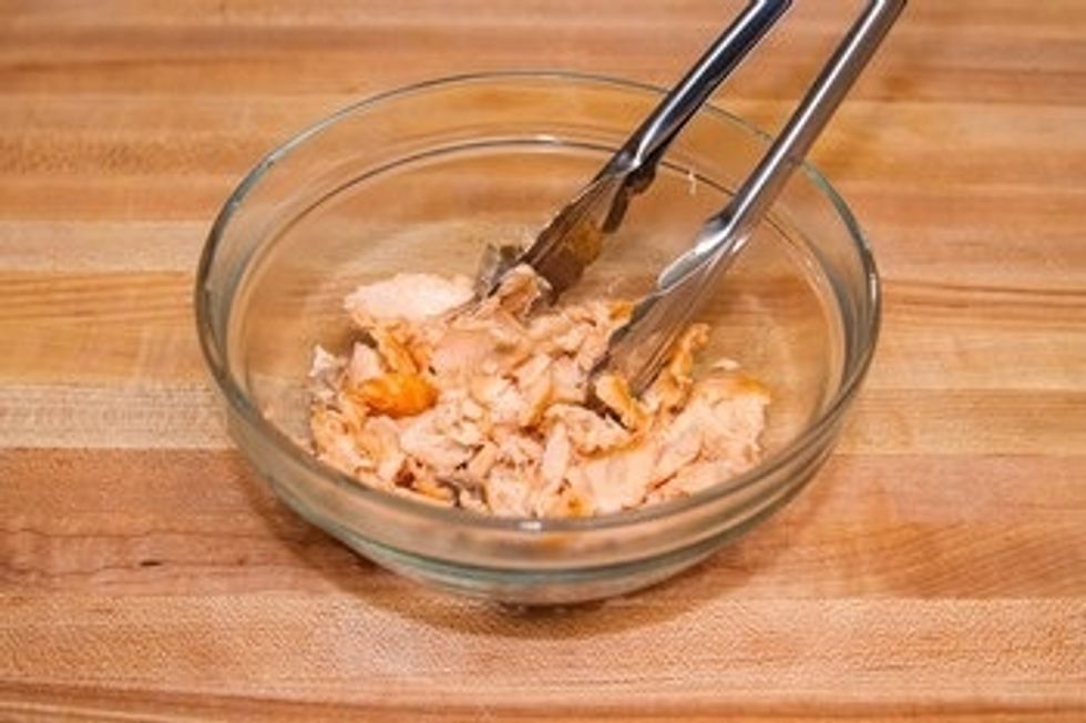 Break the salmon into small pieces.