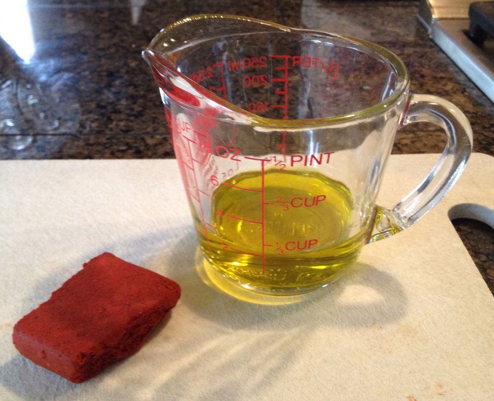 Break up 1oz of the achiote paste and mix it into the olive oil.