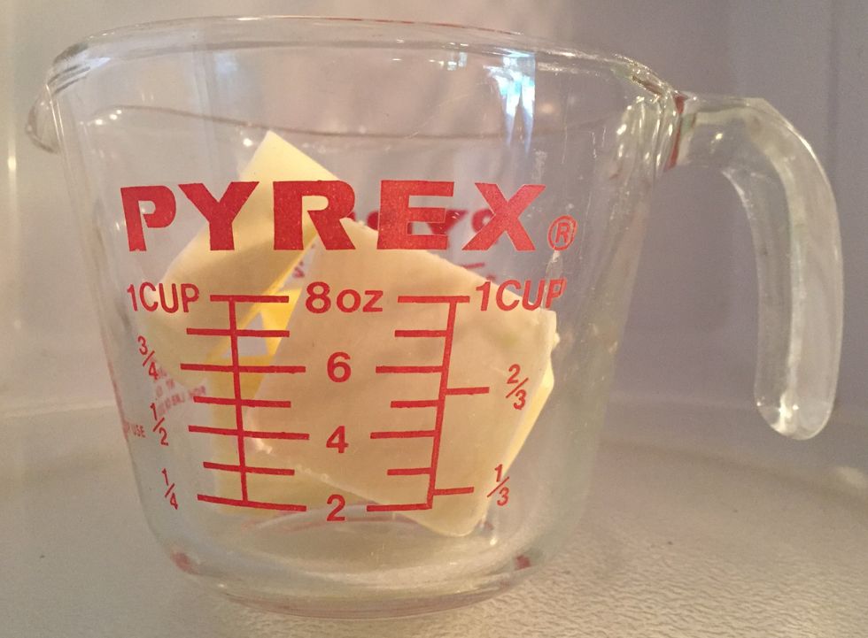 Break up one stick of butter and melt it in the microwave... or on the stove-top.