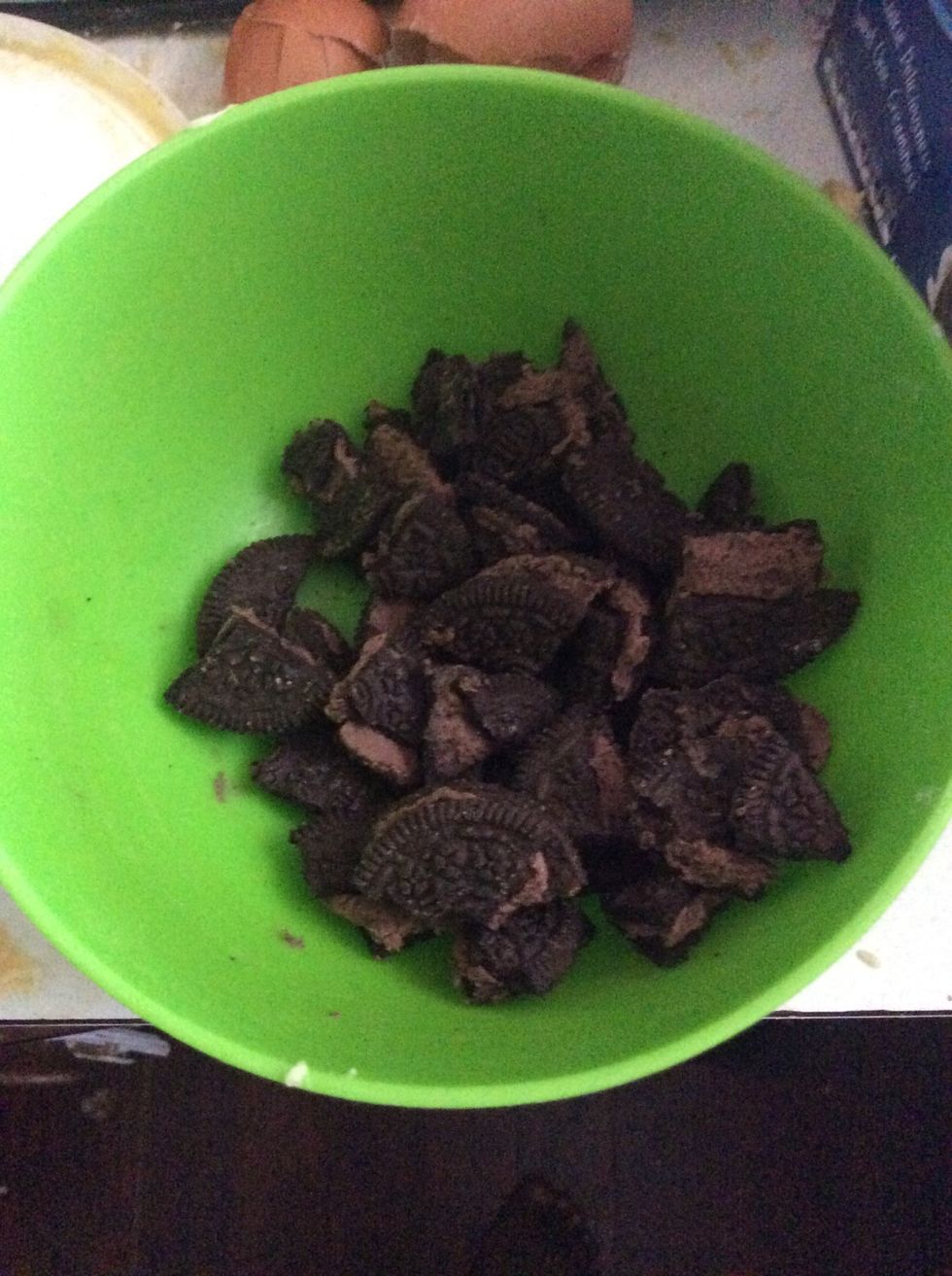 Break up pieces of Oreo and add them to the cookie mix