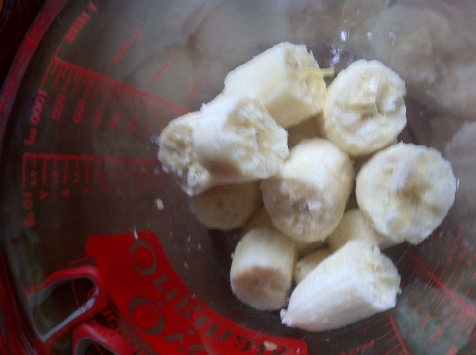 Break up the two bananas into small pieces.