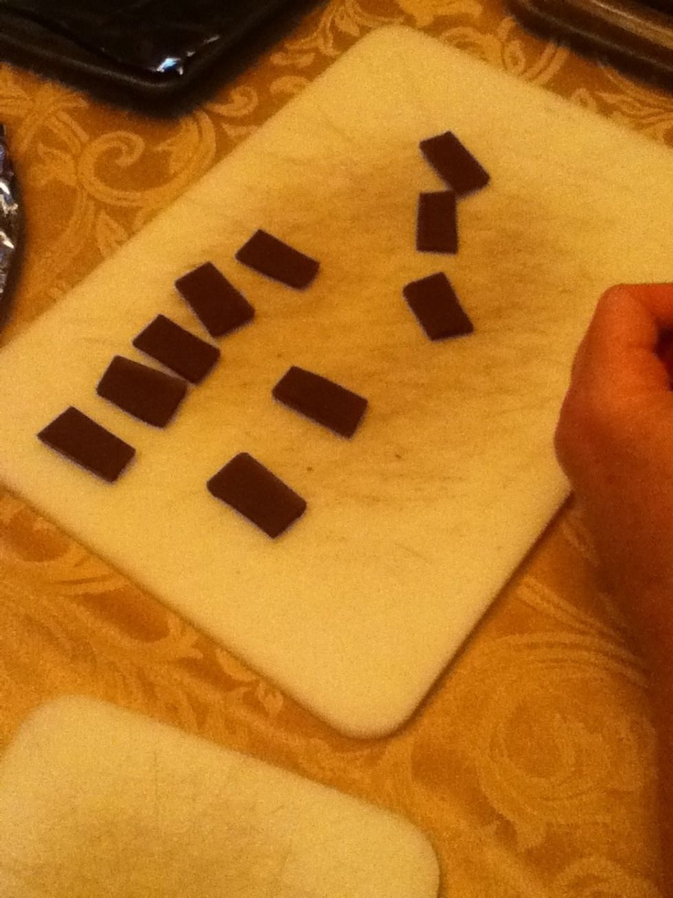 Break your Hershey bar up into small rectangles.