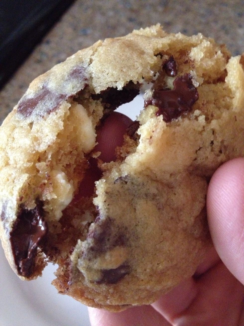 Breaking it open... Look at those yummy gooey chocolate chips! Yummmmmm....