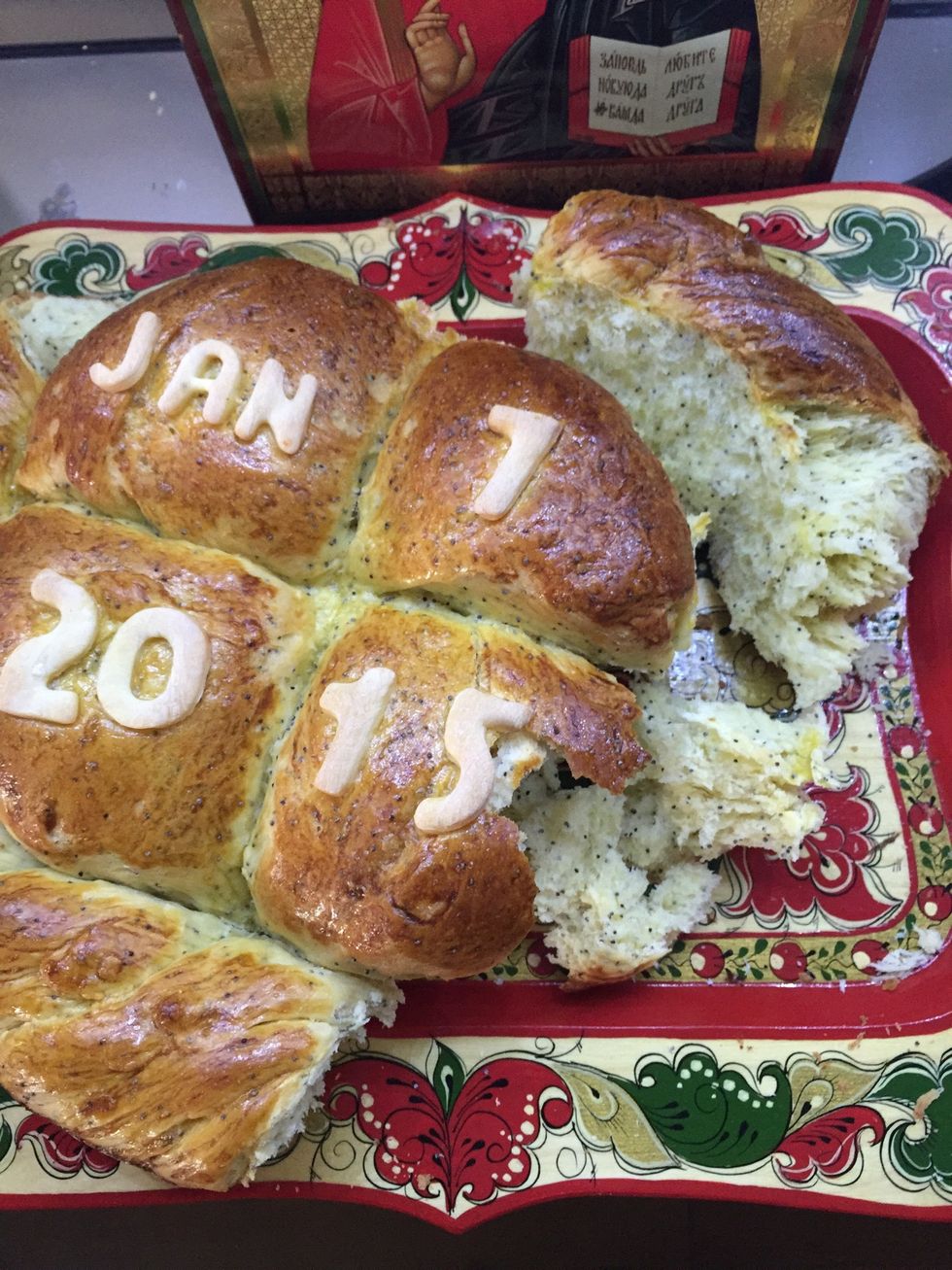 Breaking the bread has another ritual. The whole family stand around it and holding it with their hands they turn it three times and then break it and the say 'Christ is born'