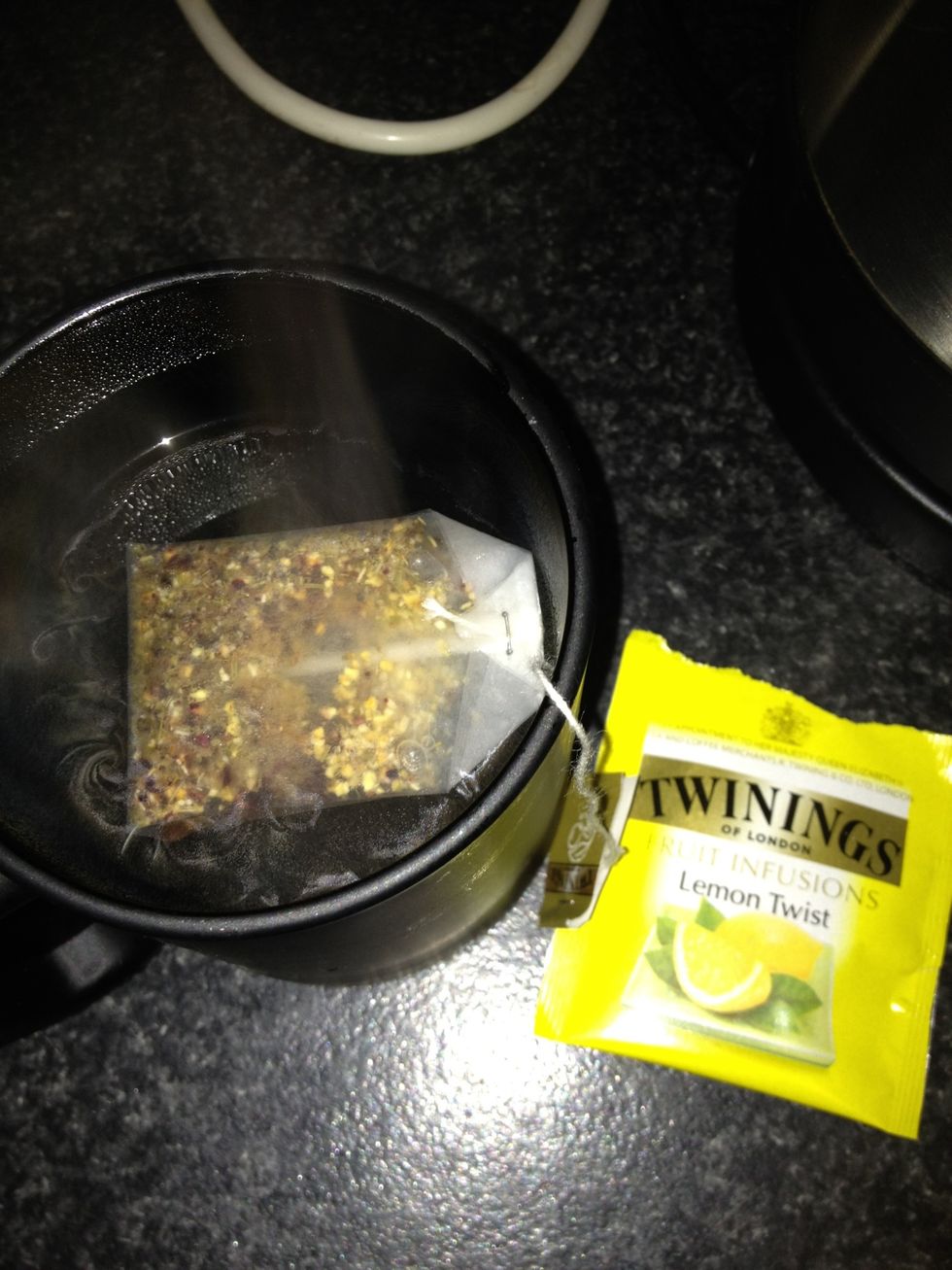 Brew the tea. You can add real lemon if you like.