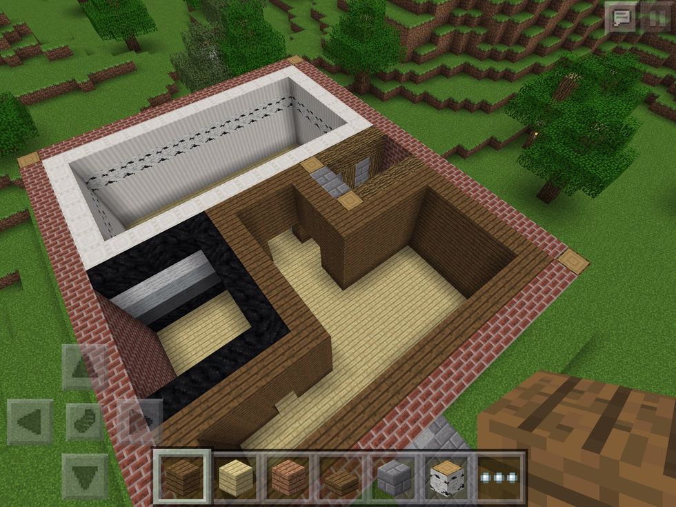 Brick walls can be a bit drab, let's make it fancy! Plan out a couple of rooms. I've gone for a downstairs bathroom, living room, cellar entrance and left a space for some stairs to be built! Phew!