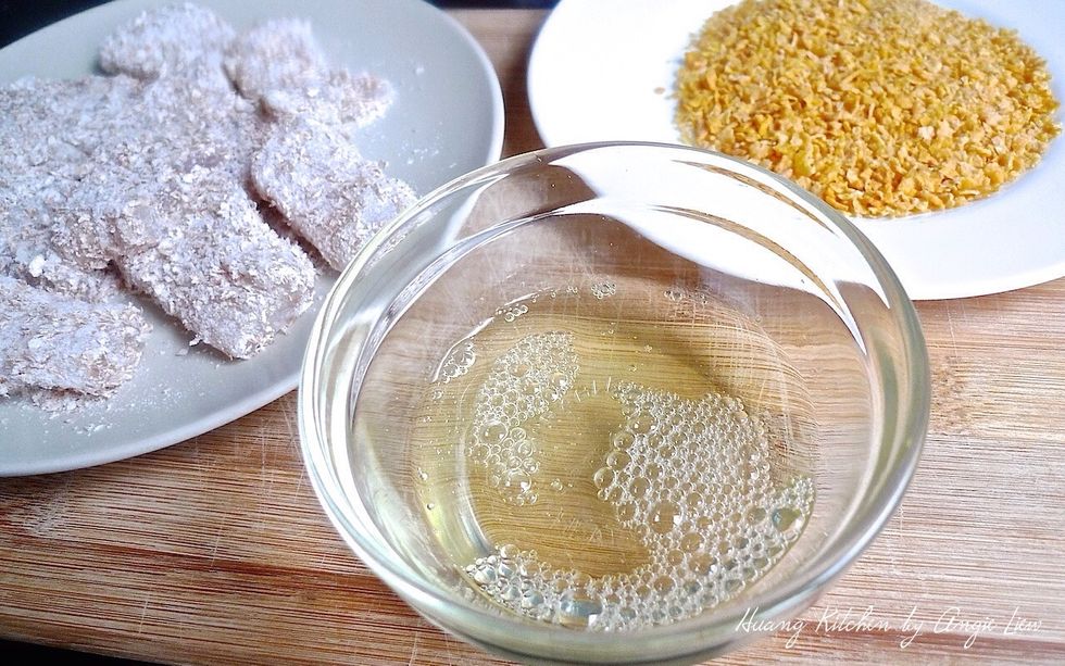 Briefly beat the egg white in a small bowl.