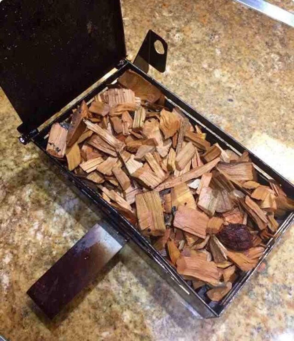 Briefly soak wood chips (no more than 5 min.) and place in the smoker box.