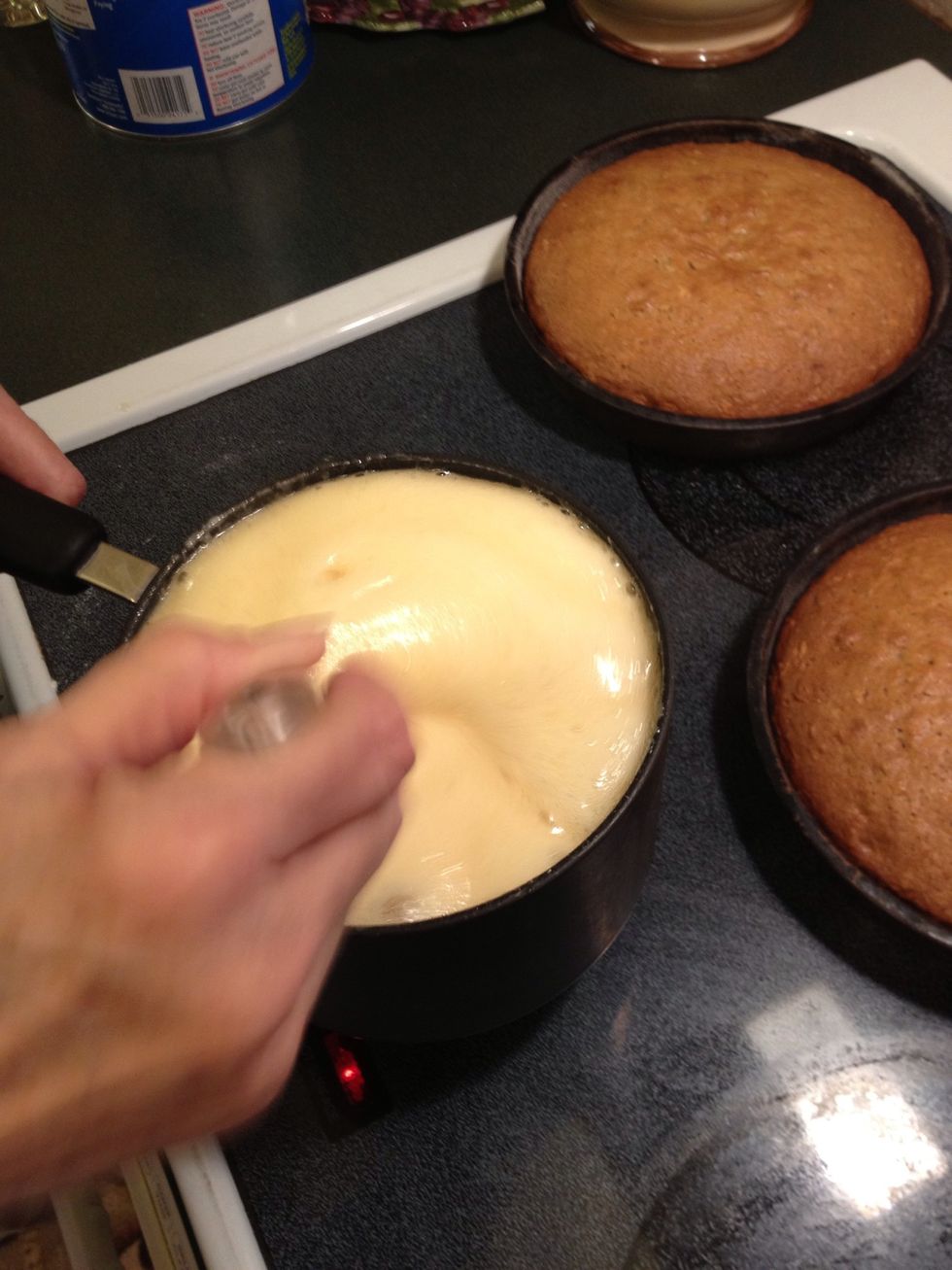 Bring 1 cup sugar, 1 1/2 teaspoons baking soda, 1/2 cup buttermilk, 1/2 cup butter, and 1 tablespoon light corn syrup to a boil over medium heat.