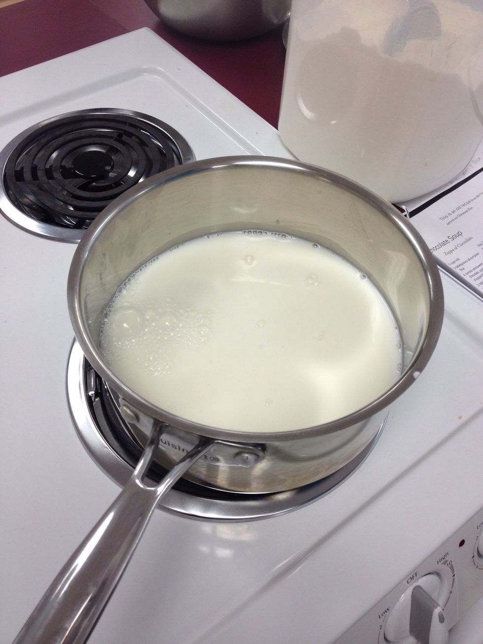 Bring 4 1/2 Cups milk just to the simmer in a medium saucepan over medium heat