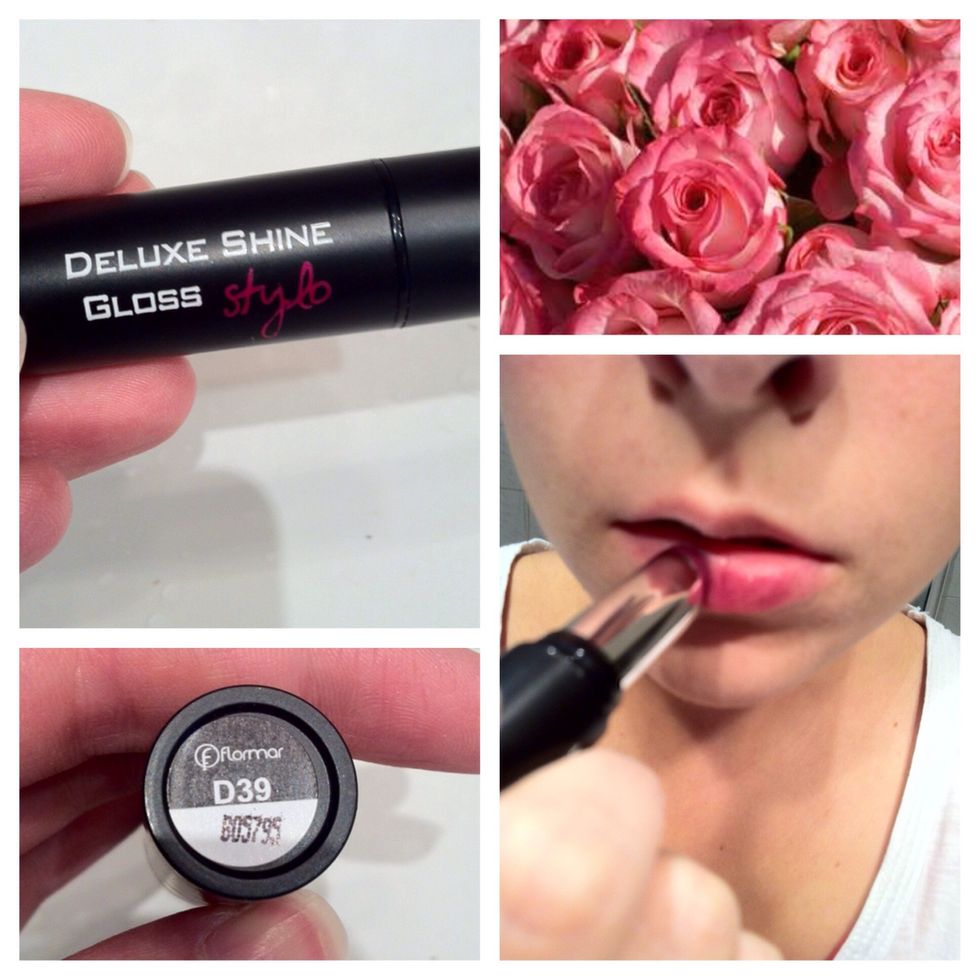 Bring a blackberry colored lipstick to your lips.