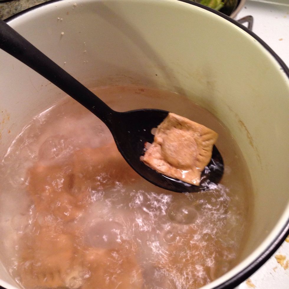 Bring a large pot of water to a boil. Salt generously. Gently lower your ravioli into the boiling water and cook for about 6-7 minutes until they rise to the top and are cooked to liking.