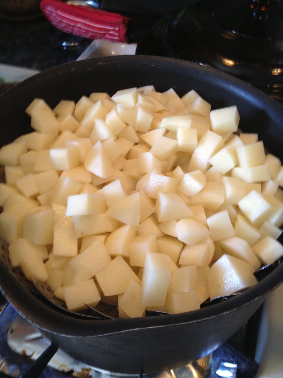 Bring a pot of of water to boil. Put steamer basket inside pot and steam for 20 minutes. You can also boil until firm for 15 minutes.