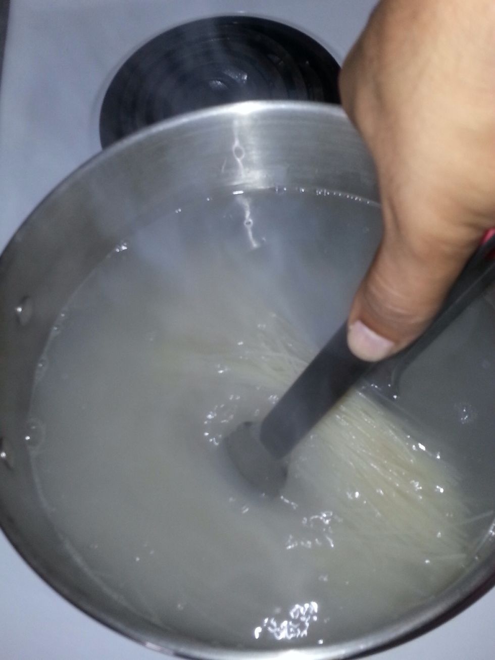 Bring a pot of water to a boil.  Add the vermicelli noodles to the water.  Cook for about 4 minutes.