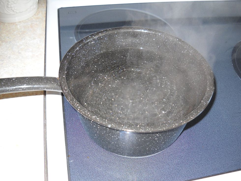 Bring cold water to a boil. This pot that I use almost fills my pitcher.