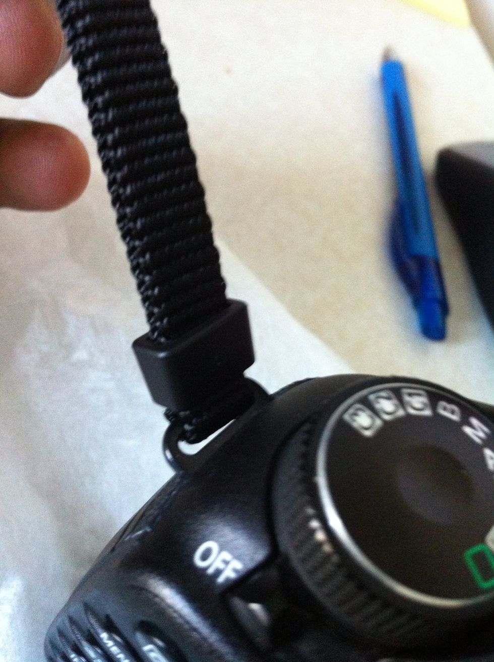 Bring down the plastic block to grip on the holder