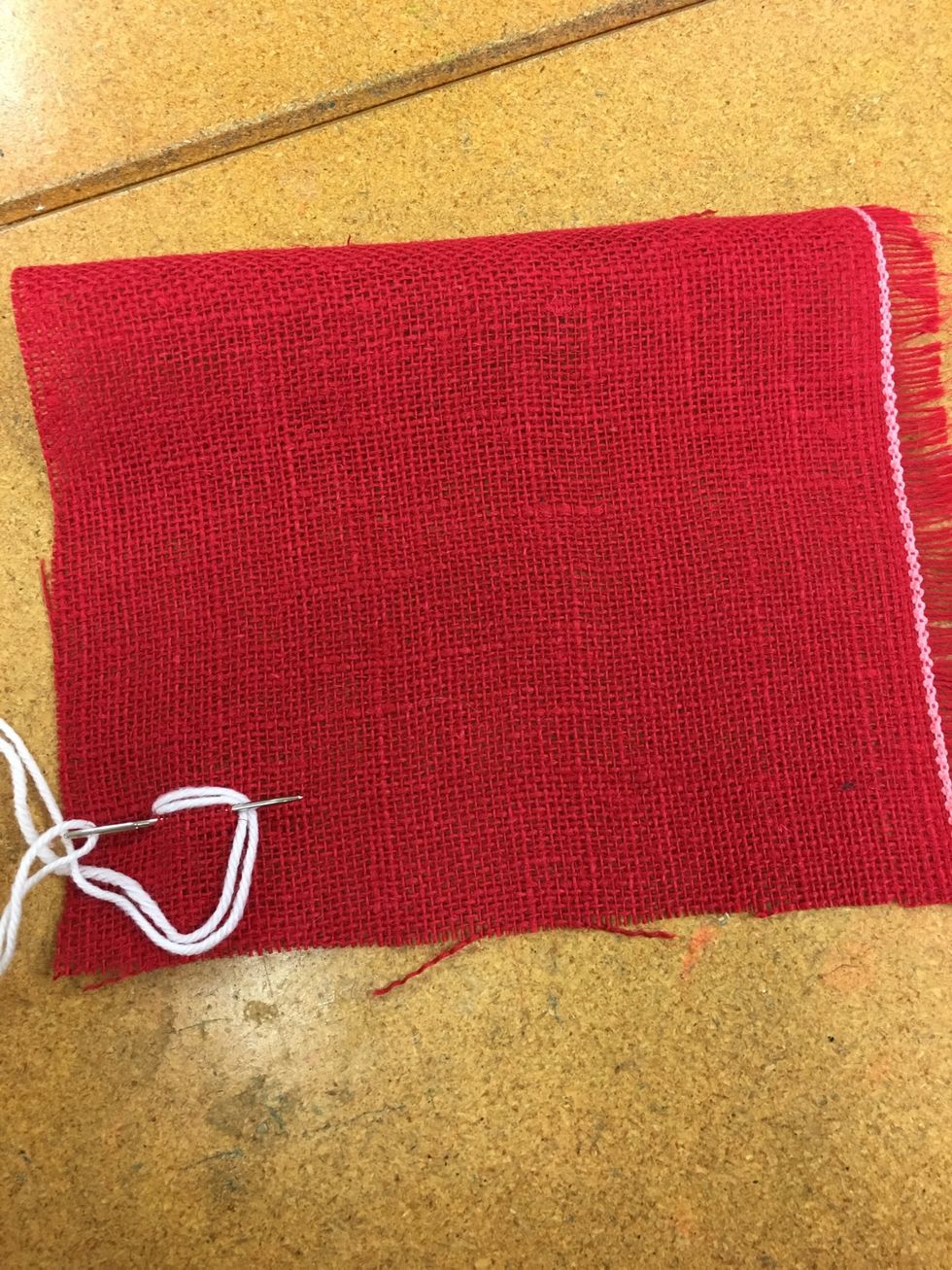 ....bring it back up right in front of the curve.  Make sure the needle is on top of the yarn.