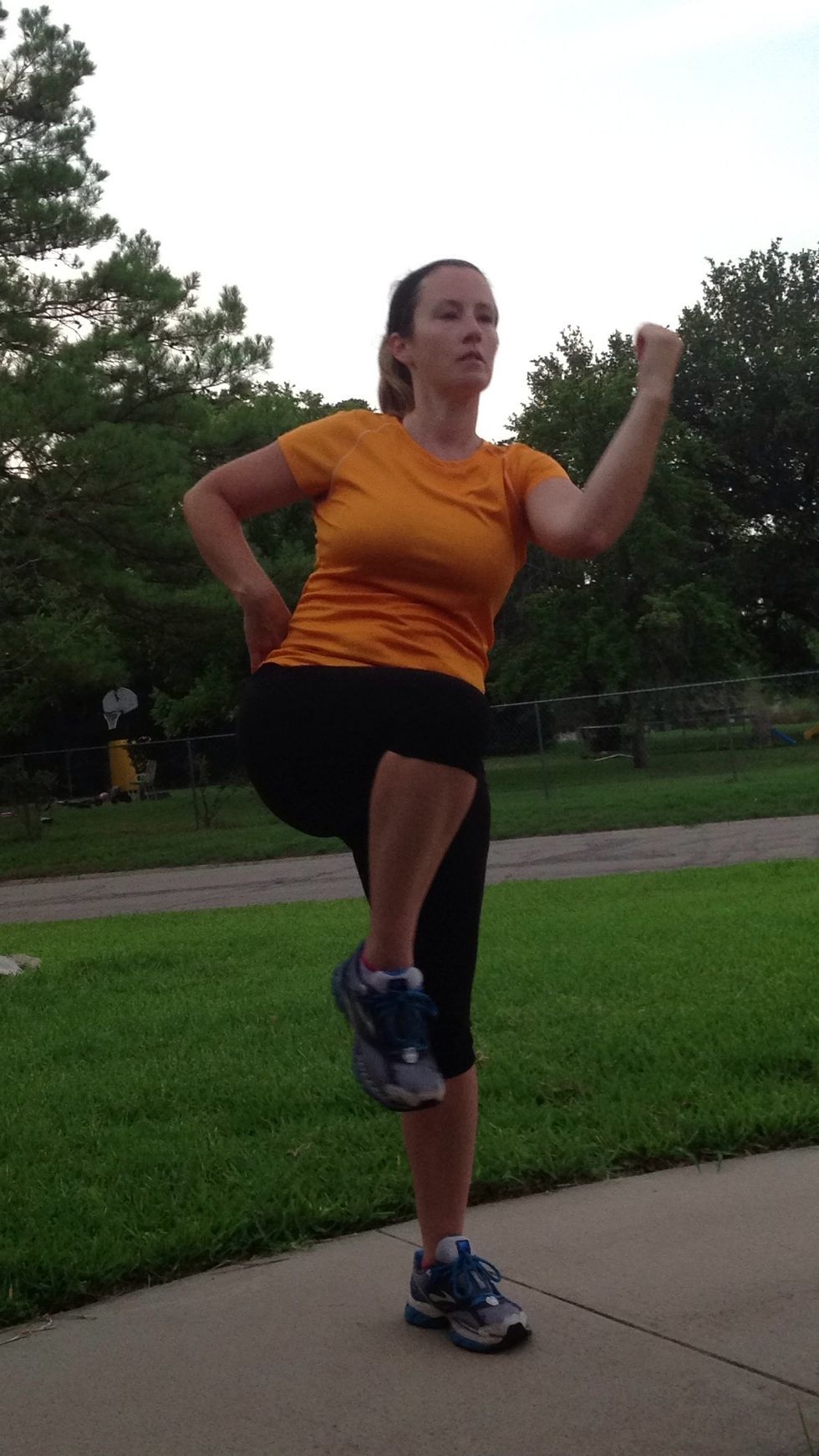 Bring knee and elbow together. Then send arm and leg back out. Try to not lower leg to the ground! Repeat 10 times.