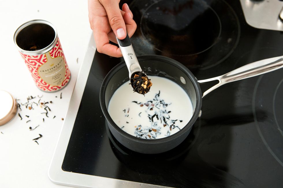 Bring milk to an almost boil over medium heat and add in 2 teaspoons tea. Reduce heat and let simmer for 10 minutes. Then, remove from heat and let steep for 10-15 minutes.