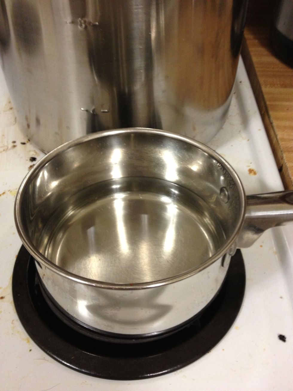 Bring one cup of water and the sugar to a boil .. Once all sugar has disappeared let it cool and mix in pitcher