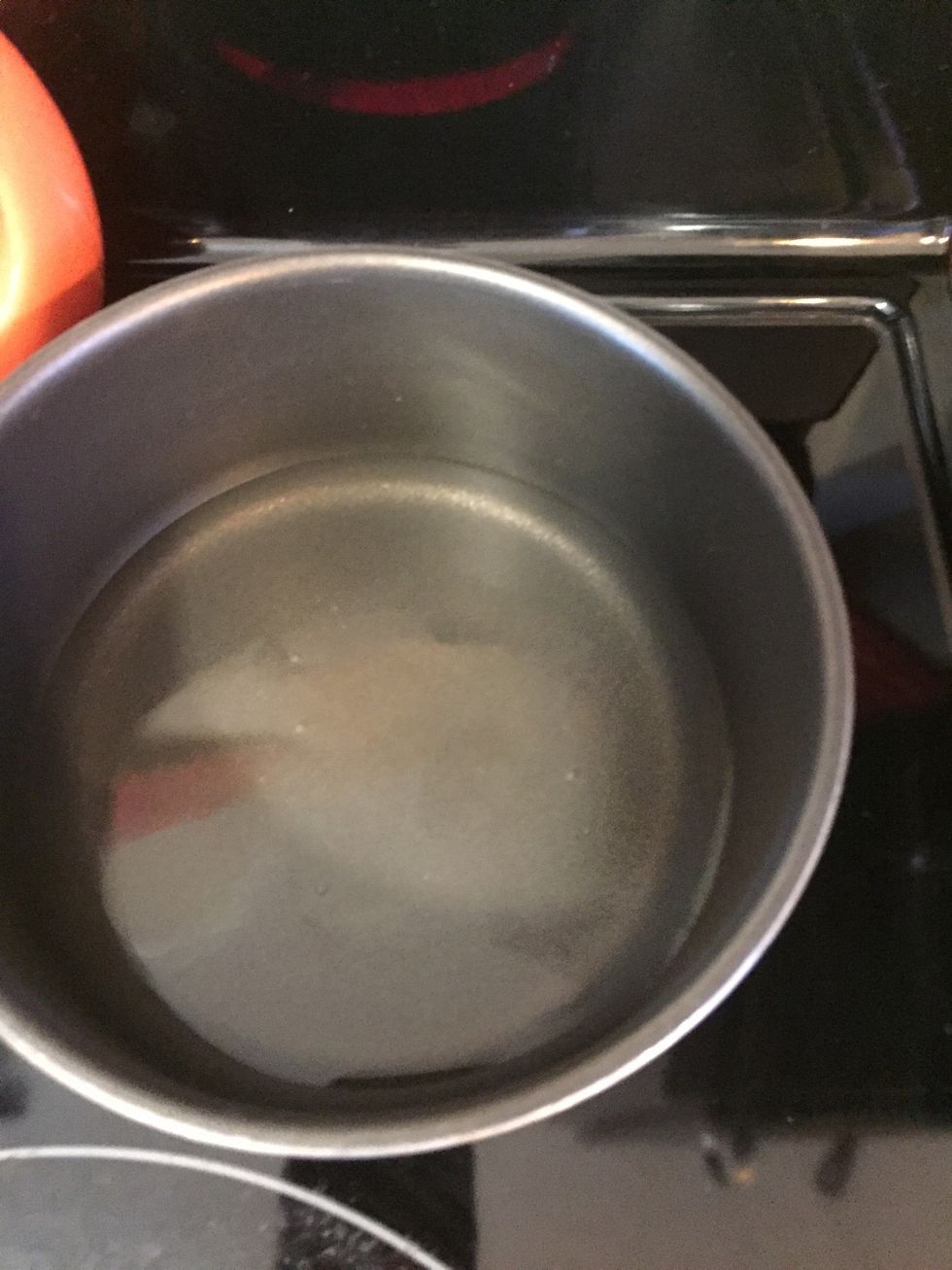 Bring one cup of water to a rolling boil on stove top