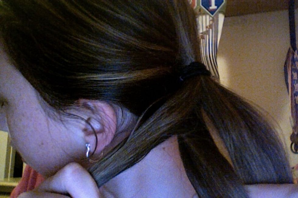 bring one strand side under/over the middle strand. the middle strand now becomes a side strand
