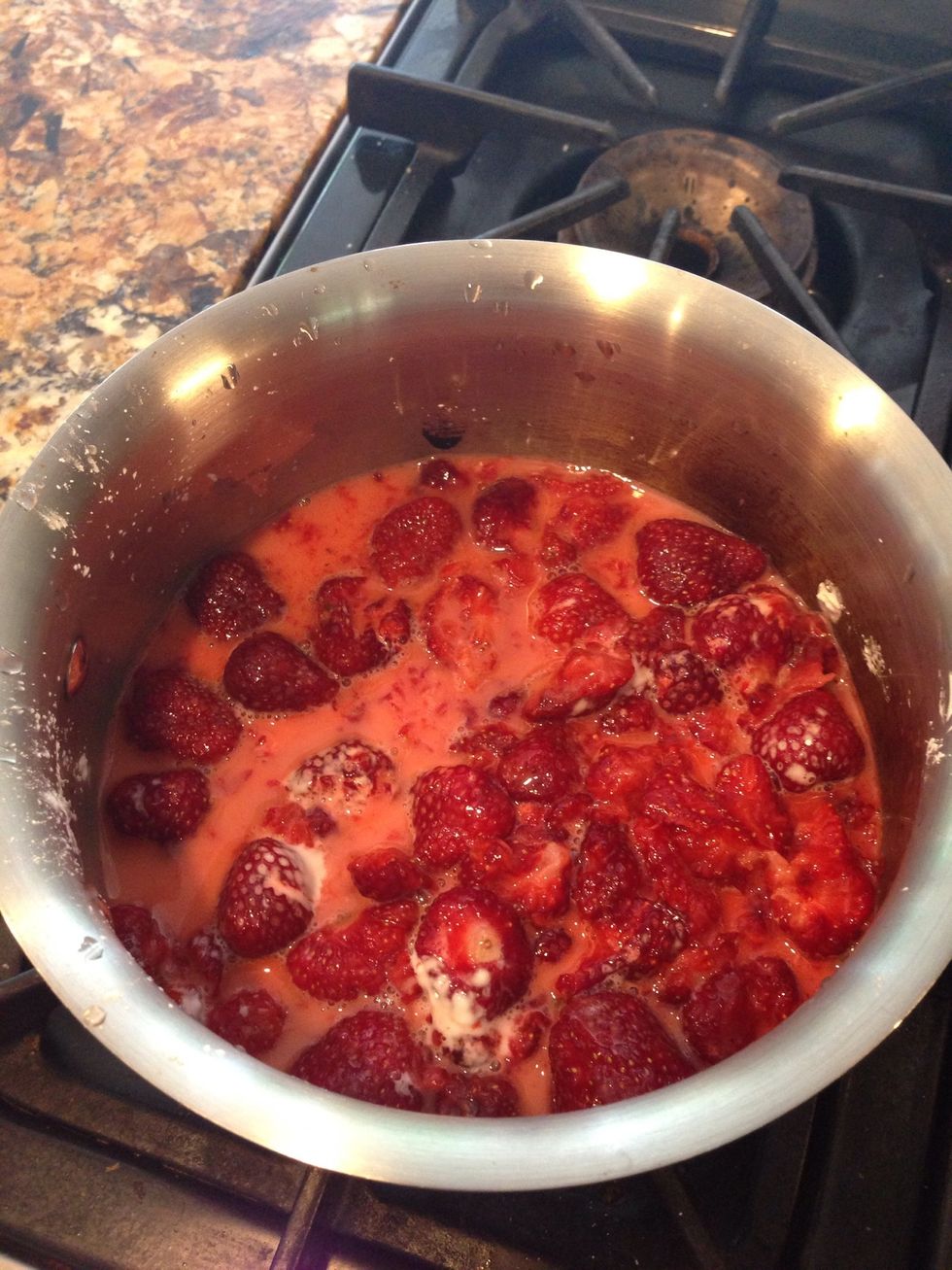 Bring sugar strawberries, water, salt and cornstarch to a boil, then lower heat to a simmer for about two minutes. Mash your strawberries with a fork, so that your mixtures resembles a chunky jam.
