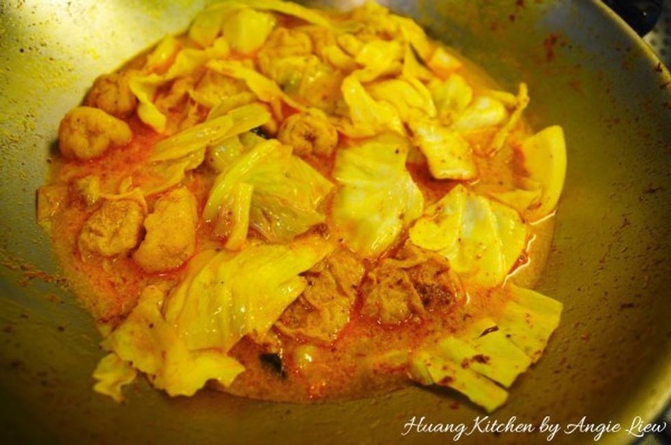 Bring the coconut milk and water to a boil.