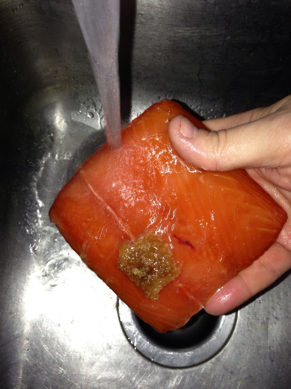 Bring the full container and a clean plate or platter over by the sink. Rinse the individual pieces carefully under cold water to remove all of the brine mix and liquid.