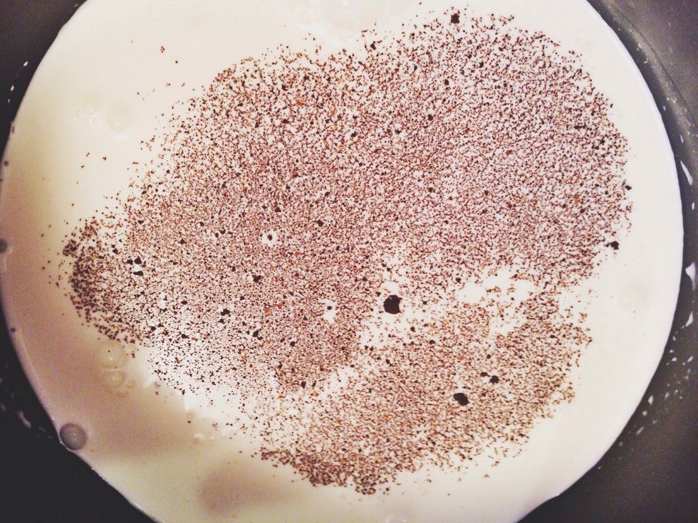 Bring the heavy cream and espresso powder to a simmer in a small saucepan over medium heat (do not boil).