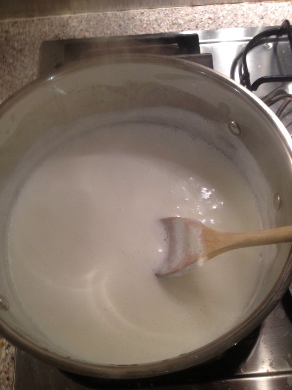 Bring the milk to the boil. Keep an eye on it, or you will spend the evening cleaning your stove.