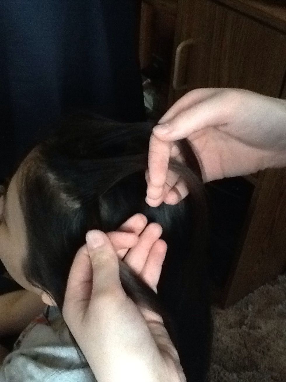 Bring the one closest to the bottom over the middle section.