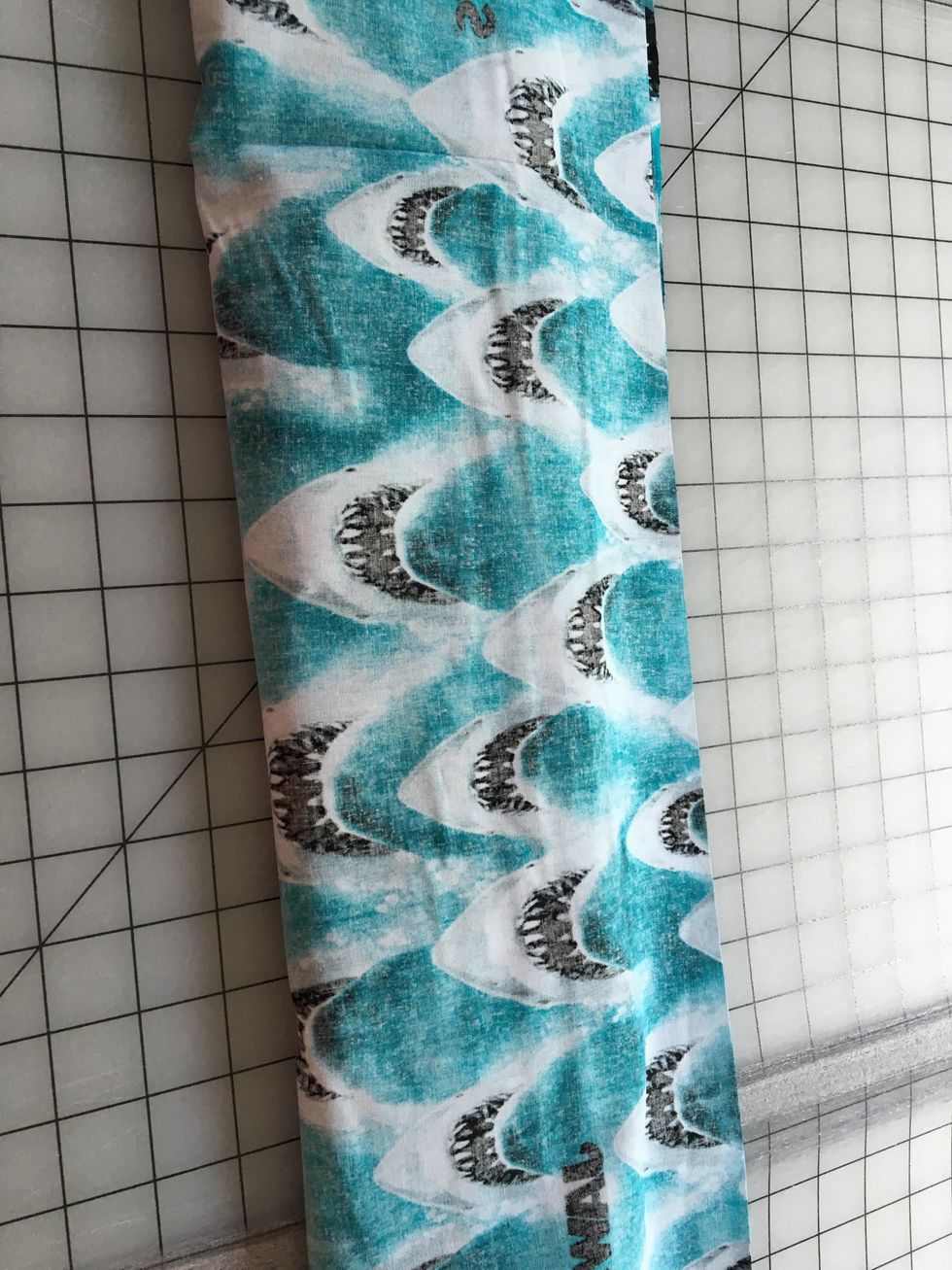 Bring the other edge of the band fabric to the top. Pin all 3 layers together, Think burrito... :)