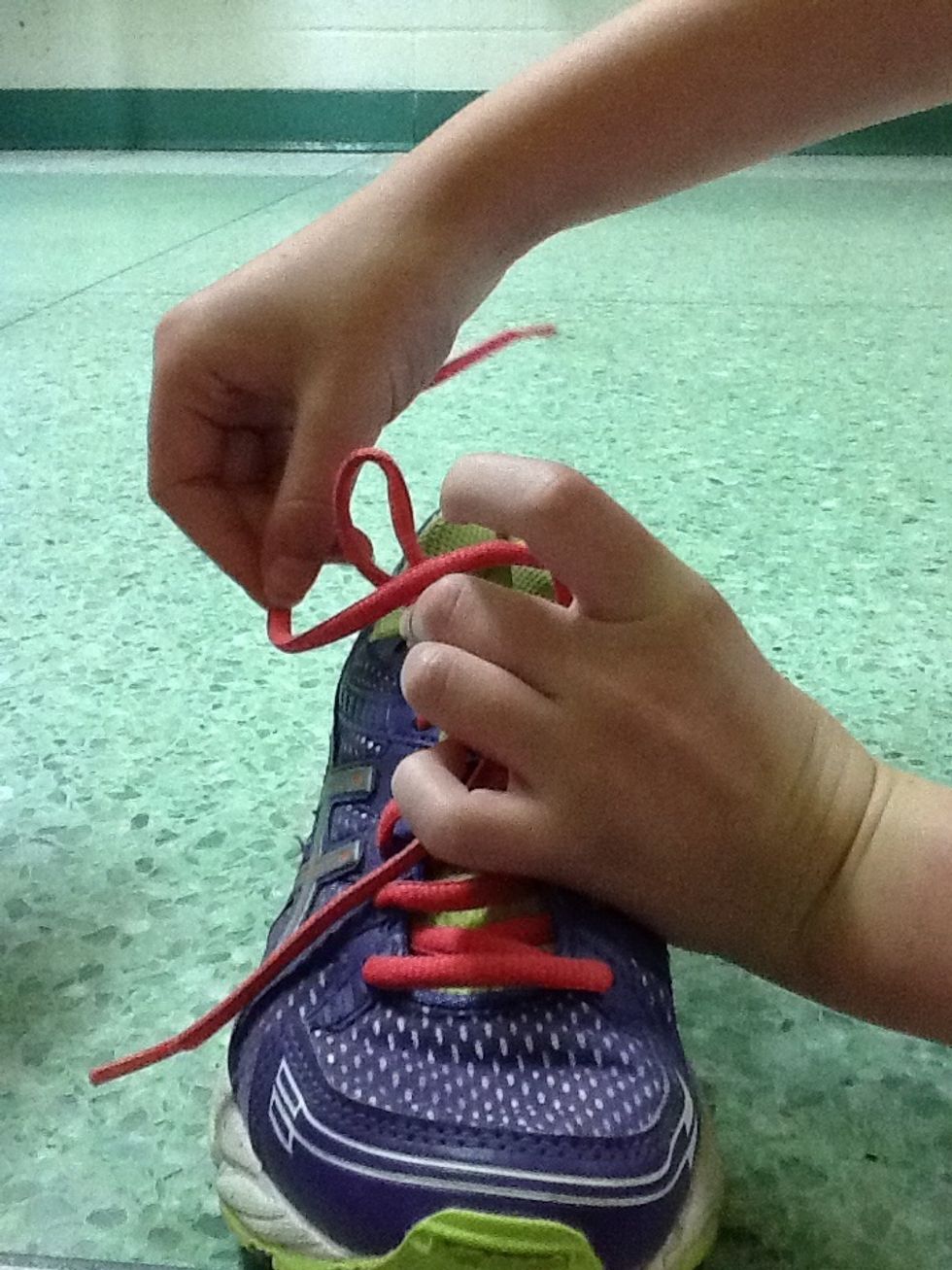 Bring the other lace around the "bunny ear"