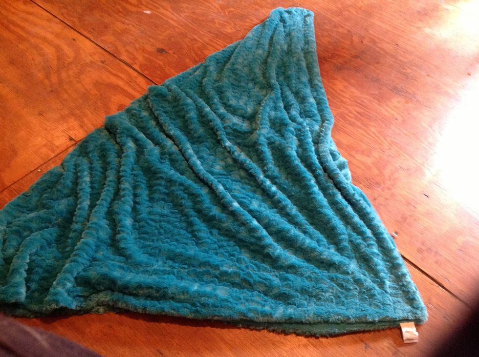 Bring the sides together and make it neater so it will be easier to fold.