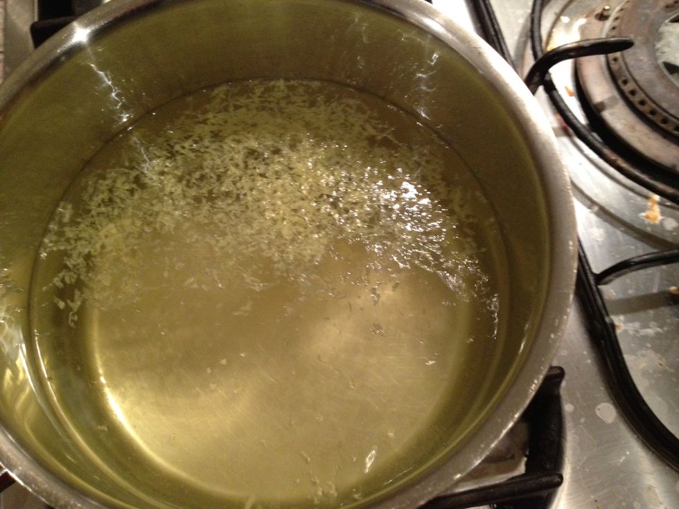 Bring the water to the boil. Add the zest of a lemon.