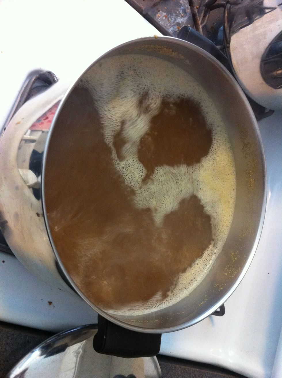 Bring the wort to a boil. Once it foams turn down the heat to bring it to a slow boil and add the first 6th of hops. Start a 60 minute timer.