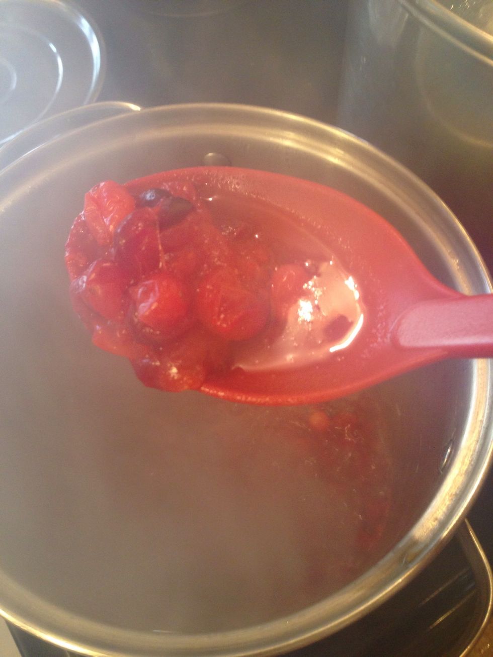 Bring to a boil, a reduce to simmer, cover & cook until berries become soft & burst. Approx 5 mins.
